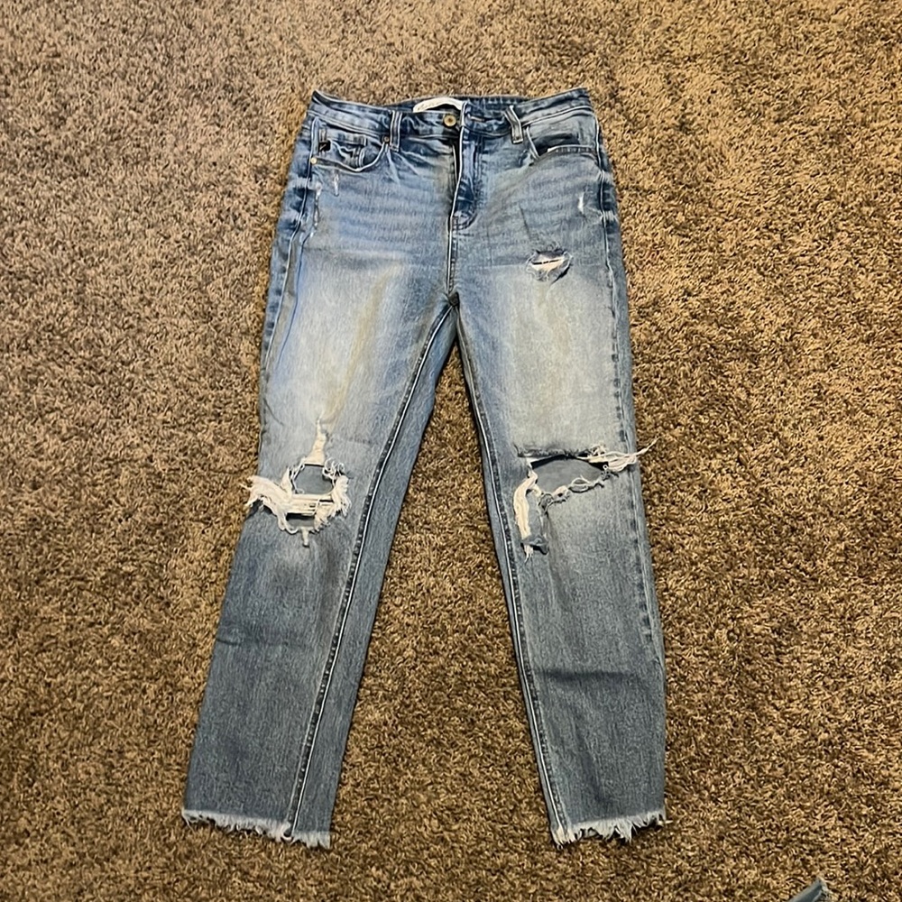 Light blue ripped jeans